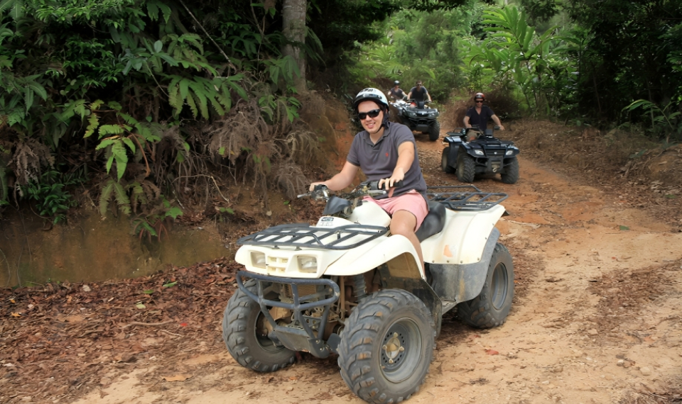 ATVs on a Samui private tour trail, showcasing the lush tropical forest
