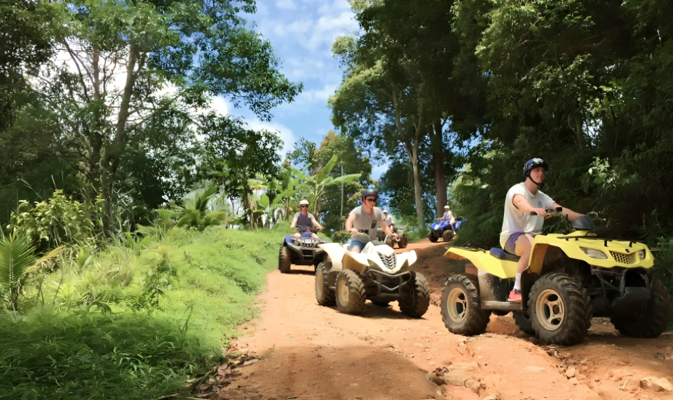 ATV riders experiencing the natural beauty on their Samui adventure tour